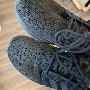 Black Adidas running shoes